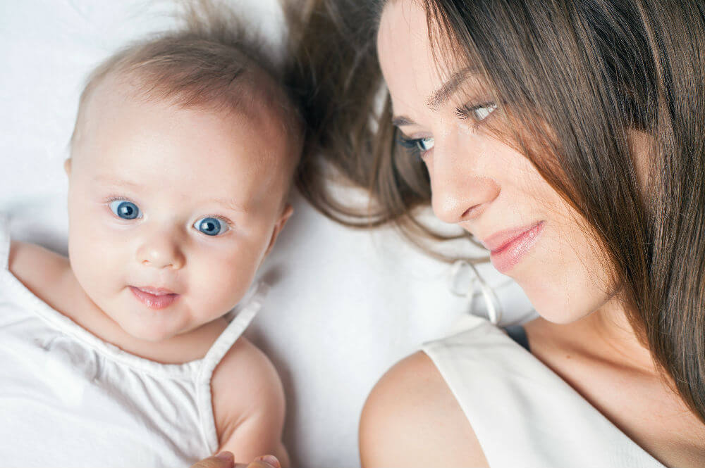 Mom and blue-eyed baby